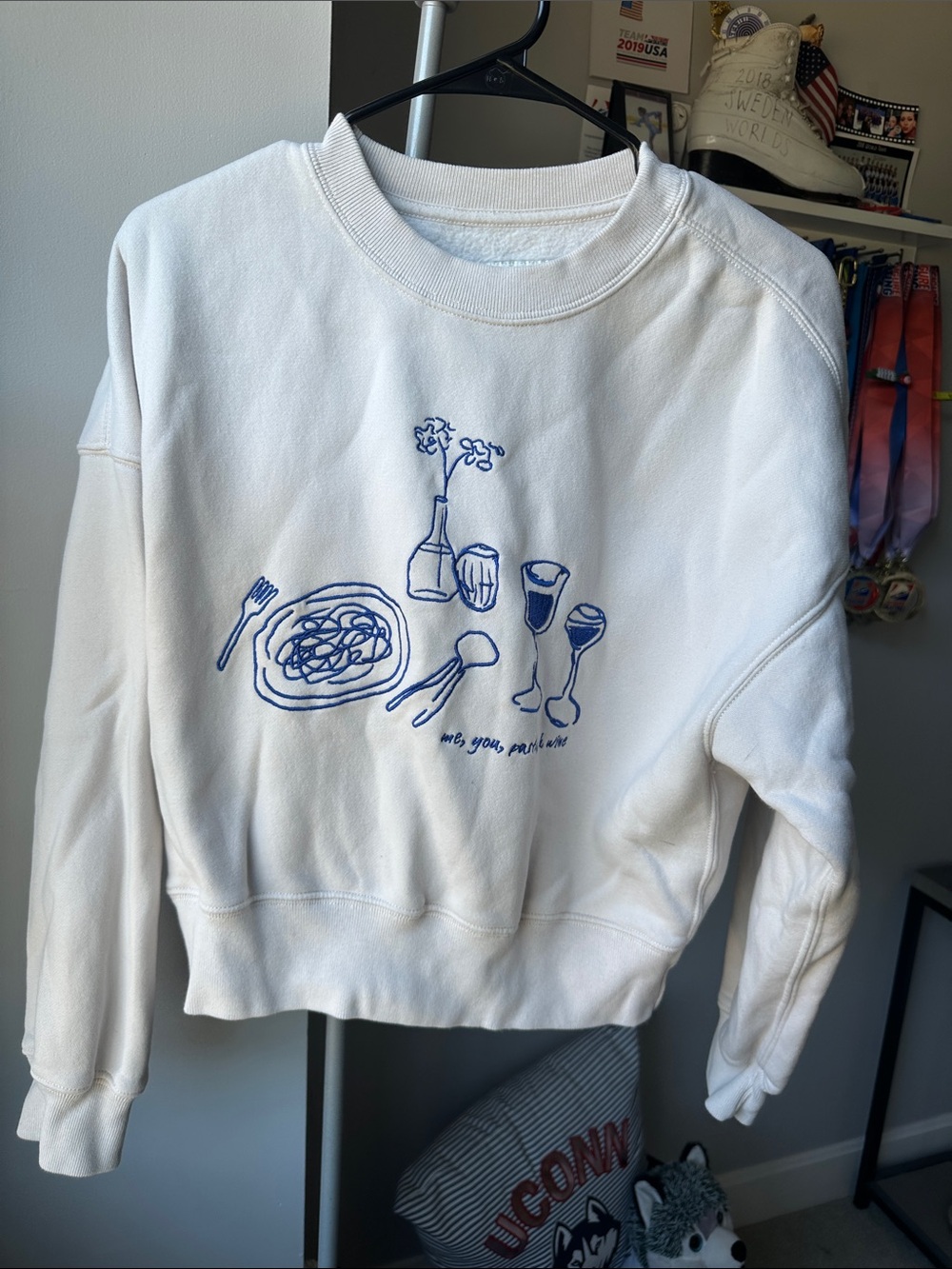 White Graphic Crewneck Sweatshirt with Blue Illustration